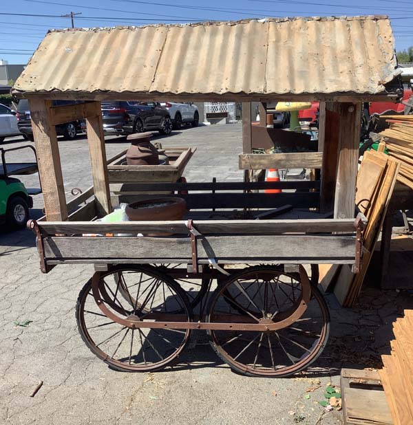 4 Wheel covered cart with corrugated roof