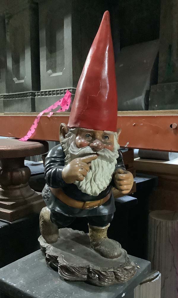 Gnome running to shush