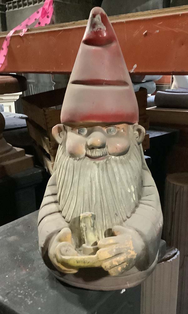 Gnome holding candle